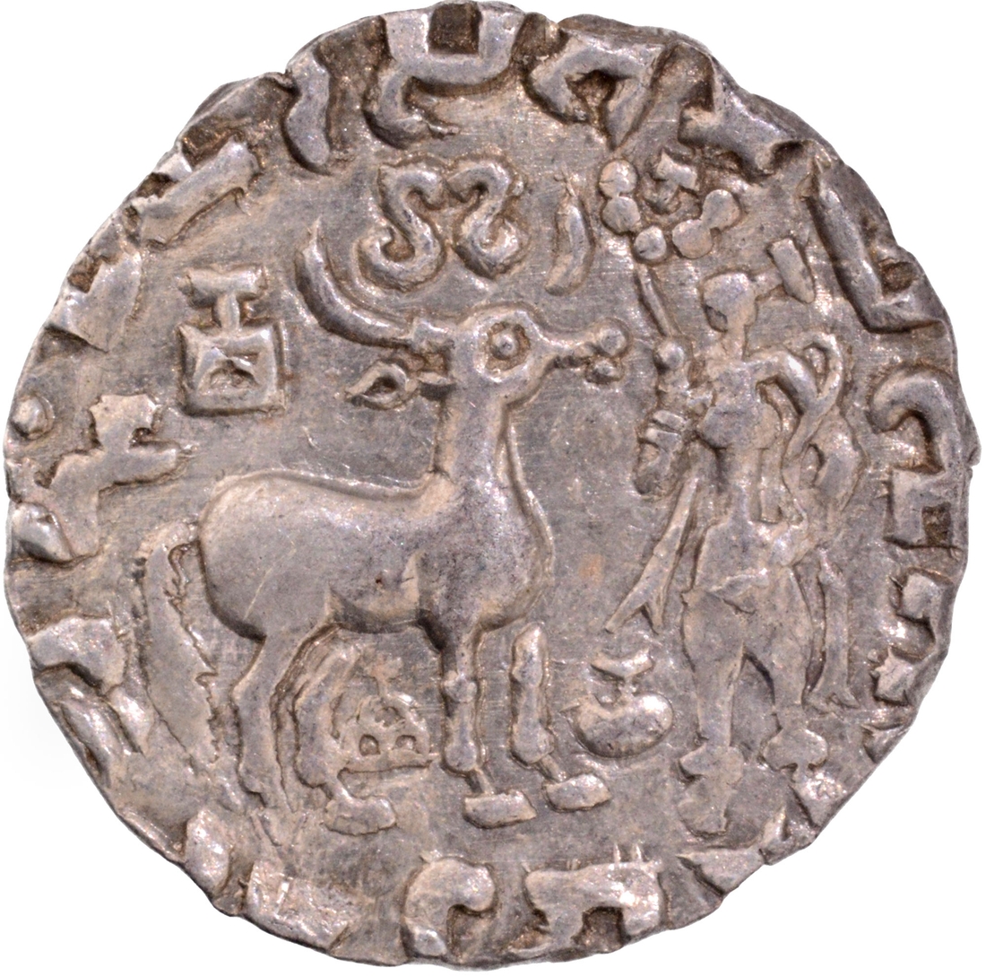 Silver Drachma Coin of Amoghbuti of Kunindas with three arched hill and Kalash on the obverse.