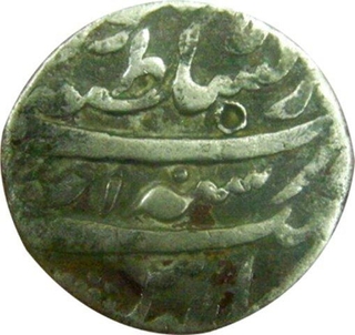 Silver Rupee Coin of Jahandar Shah of Lahore Mint.