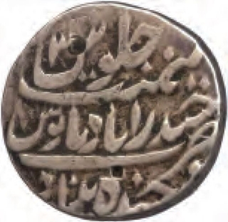 Silver Rupee Coin of Afzal ad Daula of Hyderabad State.