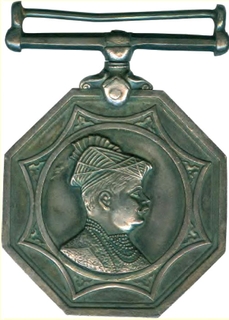 Silver Octangle Medal of Madho Rao Scindia of Gwalior State.