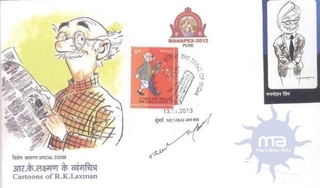 Autograph of R. K. Laxman for Honur to Manmohan Sing.