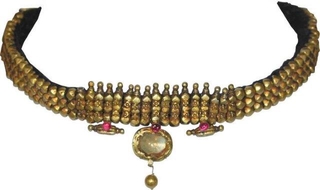 Kolhapuri Gold Necklace studdedded with Rubies and Beeds.