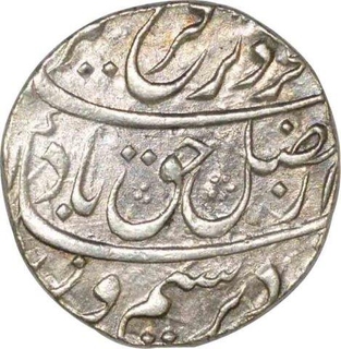 Silver One Rupee Coin of Farrukhsiyar of Out of Flan mint.