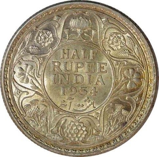 Silver Half Rupee Coin of King George V of Calcutta Mint of  1934.