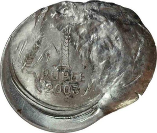 Error Steel One Rupee Coin of Republic India of 2003.