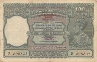 Hundred Rupee Bank Note of King George VI of signed by  C D Deshmukh Burma issue.