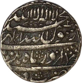 Silver One Rupee Coin  of Shahjahan of Mint Out of Flan of Month Azar.