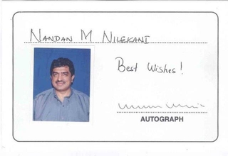 Autograph of Nandan M Nilekani of Best wishes and with Photograph and also enclosed Aadhar card envelop.