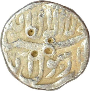 Silver One Rupee Coin of Shahjhahan out of flan Mint.