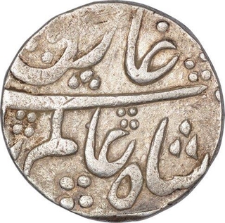 Silver One Rupee Coin of Shah Alam Bahadur of Lakhnau Mint.