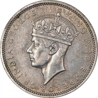 Silver Twenty Cents Coin of King George VI of Malaya .