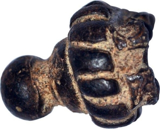 Primitive Money of  Dome shape bead.