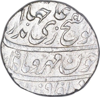 Silver One Rupee Coin of Jahandar Shah of Surat Mint.