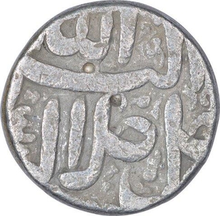 Silver One Rupee Coin of Akbar of Ahmadabad Mint of Azar Month.