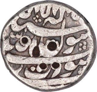 Silver Half Rupee Coin of Shah Jahan of Surat Mint.