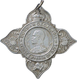 Aluminium Darbar Medal of King George V.