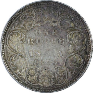 Error Silver One Rupee Coin of Victoria Empress of Calcutta Mint of 1877.