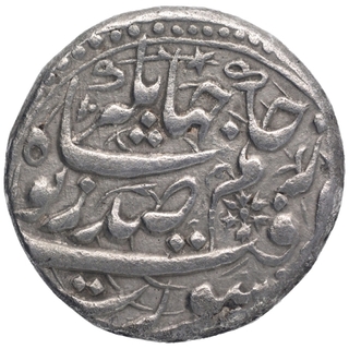 Silver One Rupee Coin of Nurjahan of Surat Mint.