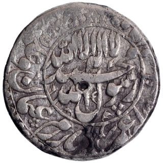 Silver One Rupee Coin of Shahjahan of Akbarabad Mint .