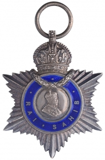 Silver Rai Sahib Medal of King George V of British India awarded to Surjya Narayan Banarji.