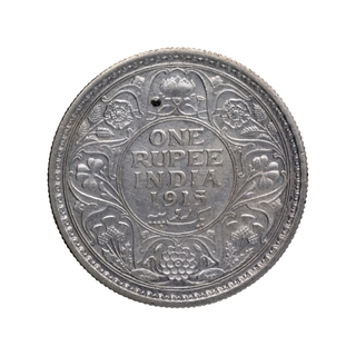 Silver One Rupee Coin of King George V of Calcutta Mint of 1915.