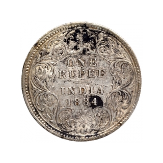 Silver One Rupee Coin of Victoria Empress of Calcutta Mint of 1884.