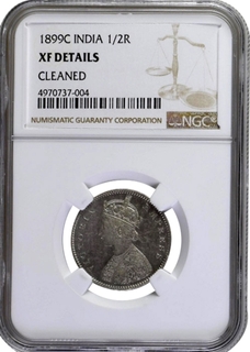 NGC Graded Silver Half Rupee Coin of Victoria Empress of Calcutta Mint of 1899.