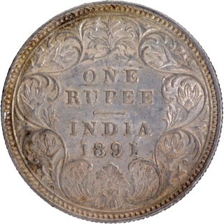 C Incused Silver One Rupee Coin of Victoria Empress of Calcutta Mint of 1891 with Ghost Impression.