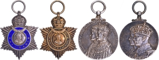 Group of Four Silver Medals of King George V & George VI of British India.