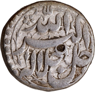 Silver One Rupee Coin of Akbar of Agra Mint of Shahrewar Month of Elahi 44 Year.