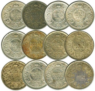 Silver Quarter Rupee (12) of King George V.