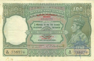 One Hundred Rupees Bank Note of King George VI Signed by C.D. Deshmukh of 1947 of Calcutta Circle.