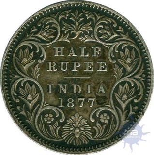 Silver Half Rupee Coin of Victoria Empress of Calcutta Mint of 1877.