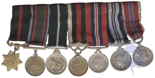 Miniature Medals of King George VI Queen Elizabeth II, and Pakistan.