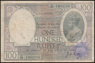 Hundred Rupee Bank Note of King George V of signed  by J W Kelly of  Rangoon Circle.