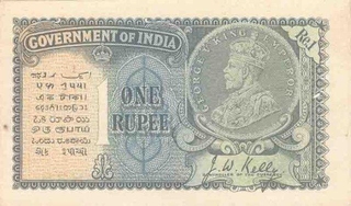 One Rupee Bank Note of King George V Signed by J W Kelly of 1935.