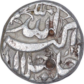 Silver Half Rupee Coin of Akbar of Lahore Mint of Aban Month.