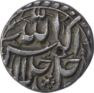 Silver Half Rupee Coin of Akbar of Lahore Mint of Azar Month.