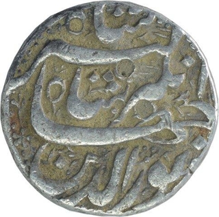 Silver One Rupee Coin of Jahangir of Qandahar Mint of Azar Month.  