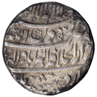 Silver One Rupee Coin of Shah Jahan of Akbarabad Dar ul Khilafa Mint of Ardibihisht Month.