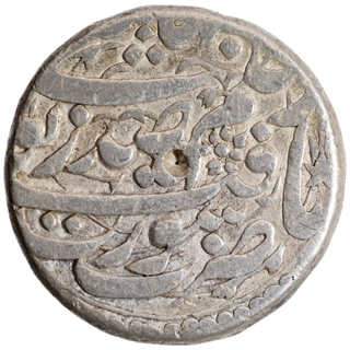 Silver One Rupee Coin of Nurjahan of Surat Mint.