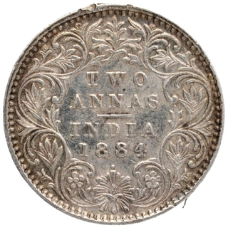 Silver Two Annas Coin of Victoria Empress of Bombay Mint of 1884.