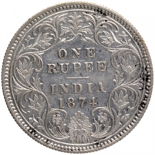 Silver One Rupee Coin of Victoria Queen of Calcutta Mint of 1874.