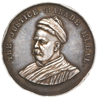 The Justice Ranade Silver Medal of Indore State.