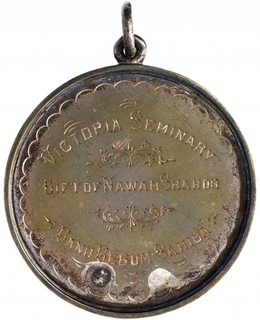 Silver Medal of Victoria Seminary Awarded for Highest Marks in Arithmetics.