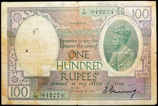 One Hundred Rupees Note of King George V signed by H. Denning of 1928.