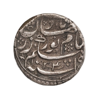 Silver One Rupee Coin of Nurjahan of Surat Mint.