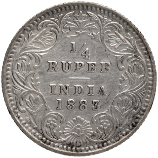 Silver Quarter Rupee Coin of Victoria Empress of Calcutta Mint of 1883.