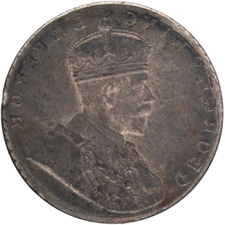 Error Brockage Lakhi coin of Silver Rupee of King George V.