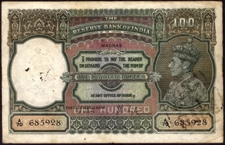 One Hundred Rupees Bank Note of King George VI Signed by J.B. Taylor of 1938 of Madras Circle.